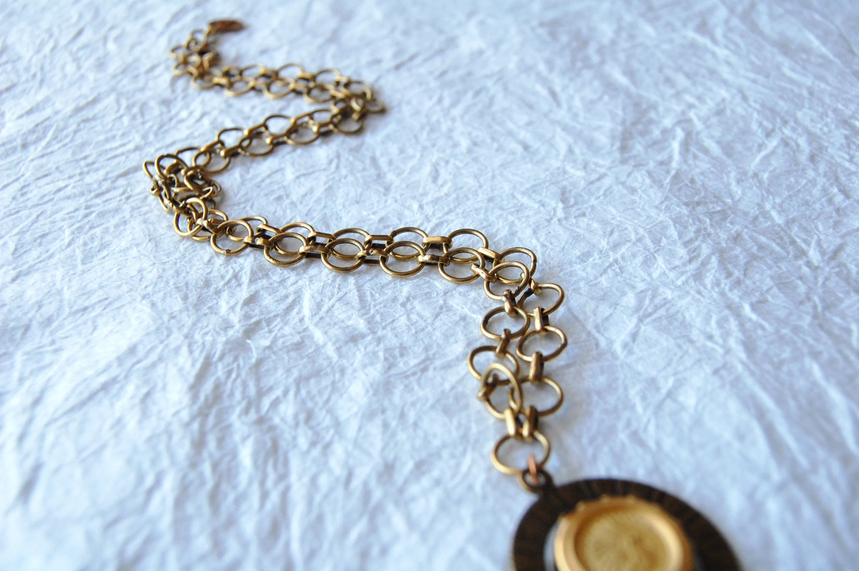 Spinning Coin Native American Inspired Solid Brass Coin Necklace, The Clarion E04173