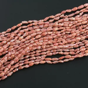 Vintage color treated iridescent freshwater oval rice pearl. Avg. 5x3mm, 16 inch strand. b15-prl124
